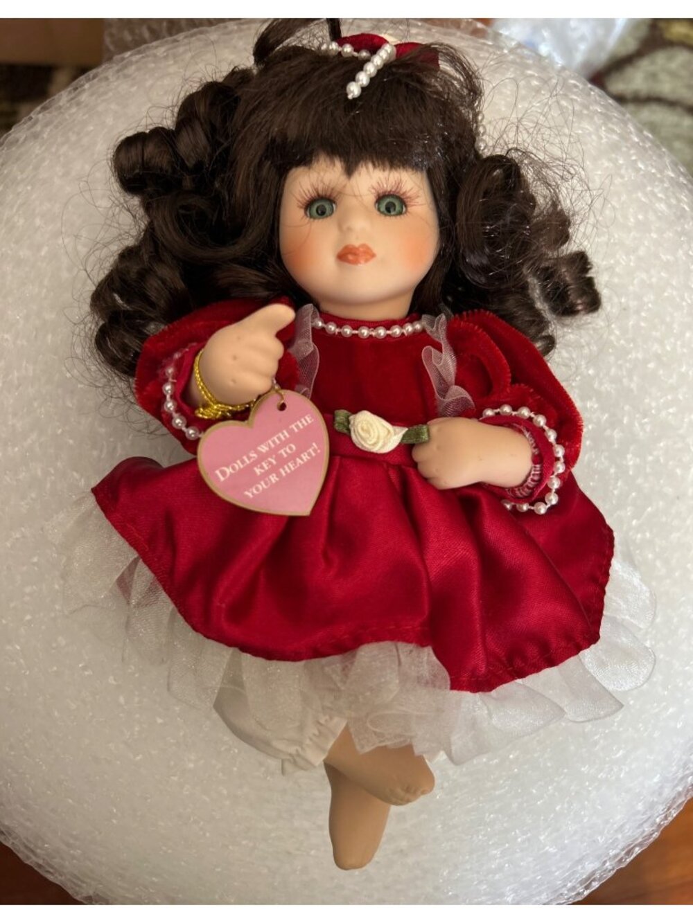 Brass Key Porcelain Doll In Red Dress With Curly Hair Pearl Accents Collectible